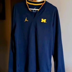 Jumpman 🎾 Michigan university tennis warmup top.